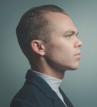 Close-up profile view of Alex Spencer